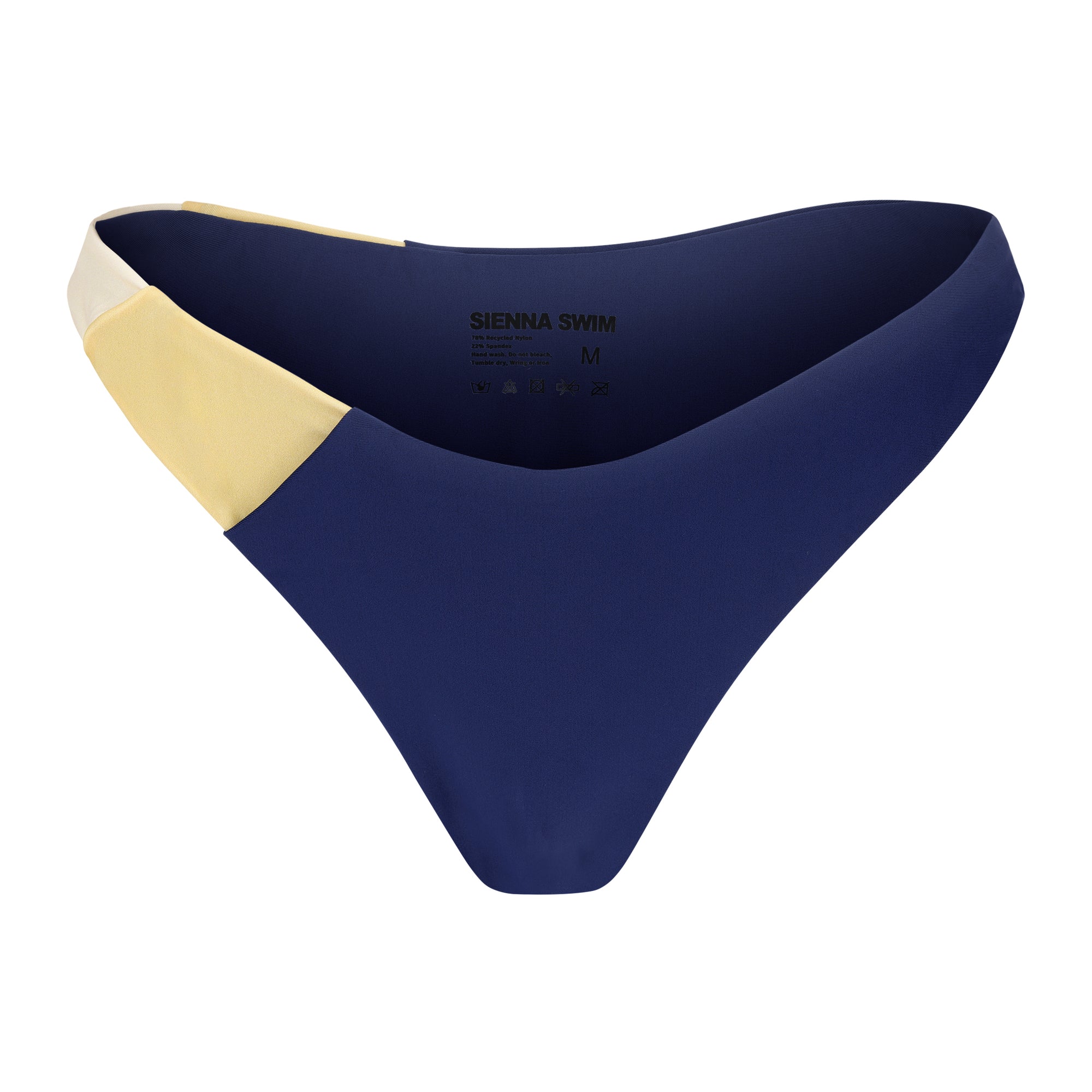 Sienna Swim Rio bikini bottom in Gold Coast with panel construction in sapphire, cream, and gold.