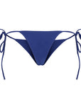 Back view of Sienna Swim Tulum string bikini bottom in Sapphire blue featuring minimal coverage and adjustable side ties.